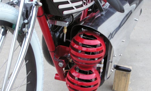Red Super Twin bike with pulse jets and intake valves reed cage